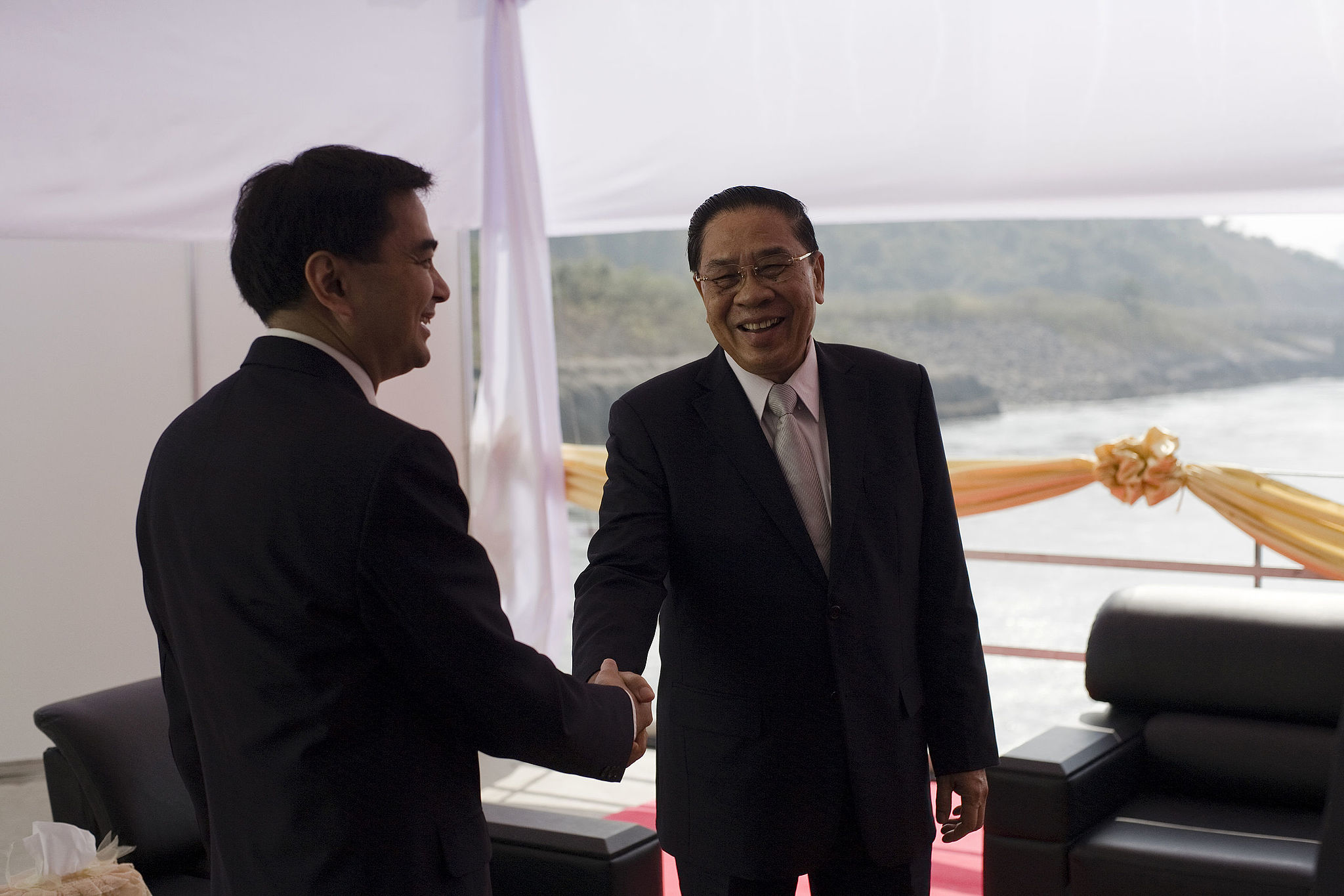 Image by Government of Thailand via Wikimedia Commons. https://commons.wikimedia.org/wiki/File:Choummaly_Sayasone_2010-12-9_1.jpg