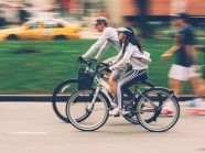 Cyclists riding without helmets